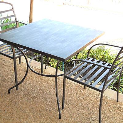 Bistro square metal table with Manhattan carvers