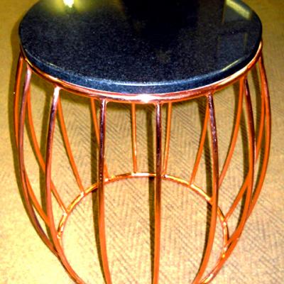 Drum side table in copper finish with stone top